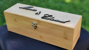 Personalized bamboo wine gift box with custom engraved names – front view