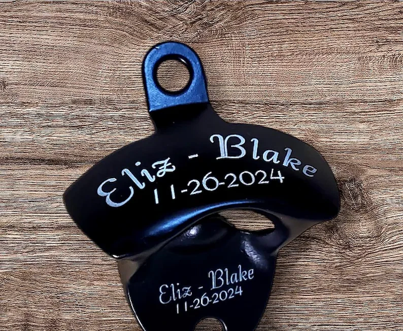 Personalized wall mounted bottle opener engraved with two names and a date